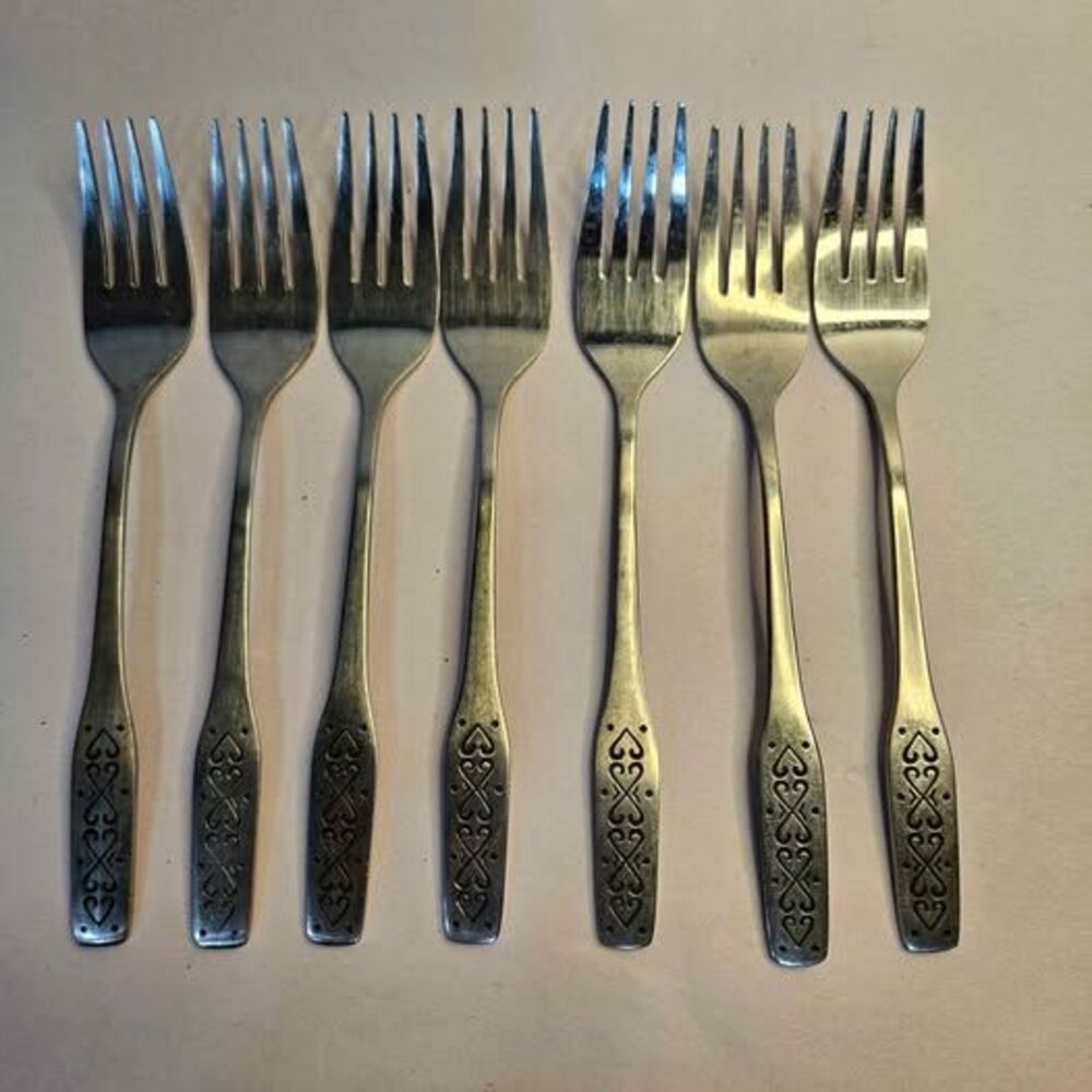Set of 7 Vintage Stainless Steel Forks with Heart Pattern - Singapore